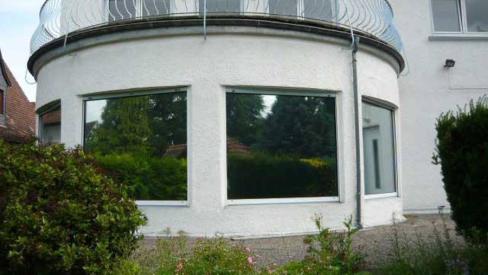 Sonnenschutzfolie - Spiegelfolie für eine Physiotherapie Praxis in Groß - Gerau
